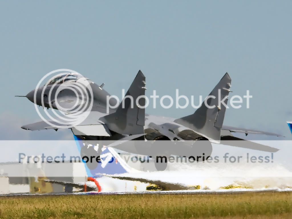 IMAGE: http://i1046.photobucket.com/albums/b466/EarthonFirePhotography/Date%20With%20a%20Russian/heavyclone.jpg