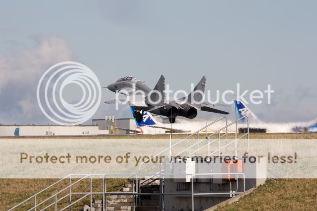 IMAGE: http://i1046.photobucket.com/albums/b466/EarthonFirePhotography/Date%20With%20a%20Russian/heavyclonebefore.jpg