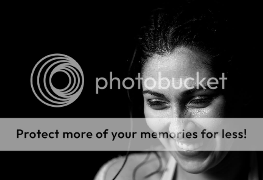 IMAGE: http://i1046.photobucket.com/albums/b466/EarthonFirePhotography/Emily/wetanddark1bw.jpg