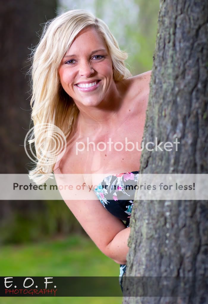 IMAGE: http://i1046.photobucket.com/albums/b466/EarthonFirePhotography/Natalie/peakaboowm.jpg